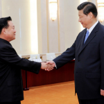 Chinese leader, Xi Jinping, right, greets North Korean envoy, Vice Marshal Choe, in Beijing on Friday. Rao Aimin/Xinhua, via Associated Press
